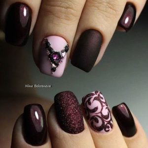 Burgundy and Pink Decorated Nails