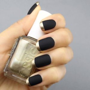 French manicure with black and gold