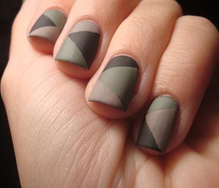 Different shades of gray nail polish on short nails