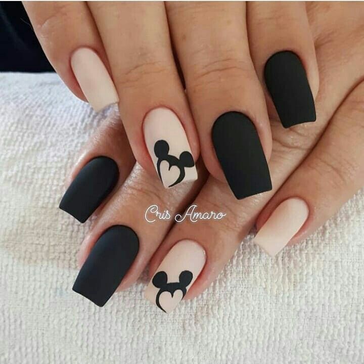Black and white nails with Mickey Mouse print 