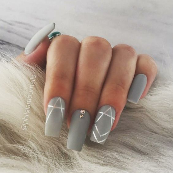 Gray matte nails with geometric shapes