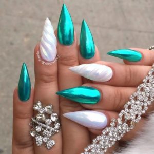 green and white stiletto nails with 3D prints