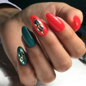 green and red nails with holographic patterns