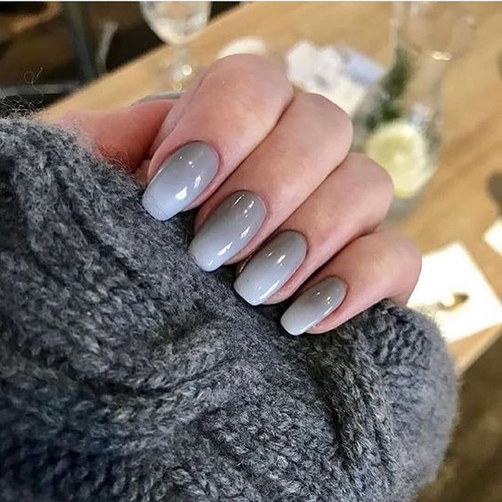 Taupe ombre nails with extra gloss 