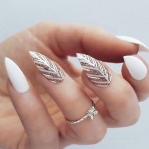 White stiletto nails with gold foils