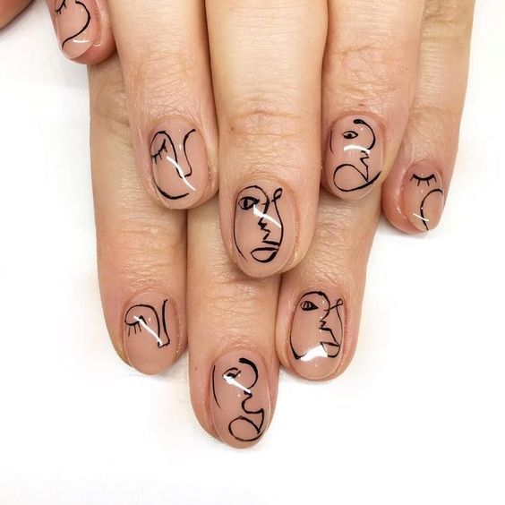 Abstract nail art of faces