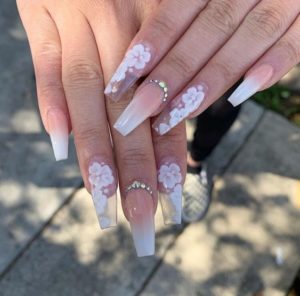 floral nail art on clear acrylic nails