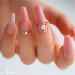 pearl detailing on nude pink nails