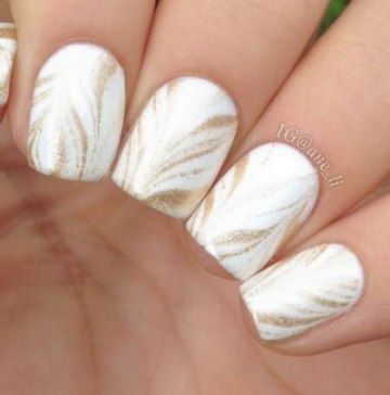 Soft gold strokes from centre of nail