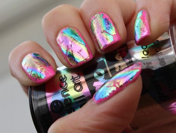 Chrome nail foil on bright pink nails