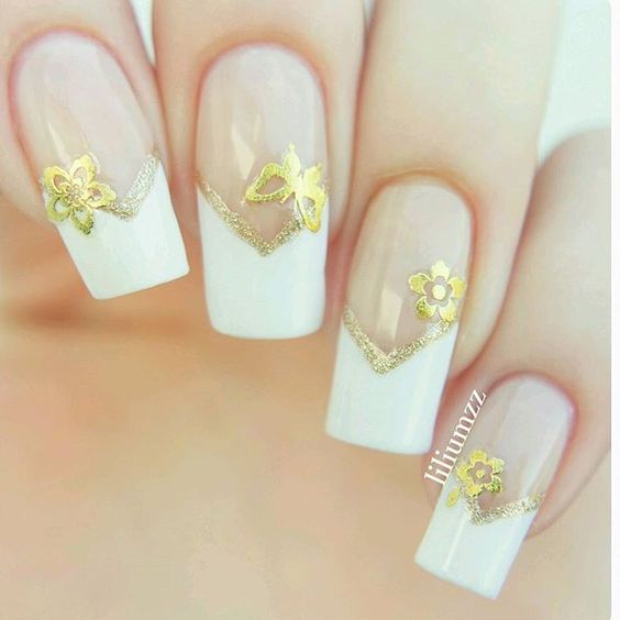 French manicure with gold edge and gold flower