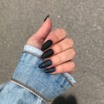 matte black and glitter almond nails