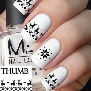 black and white snowflake nails