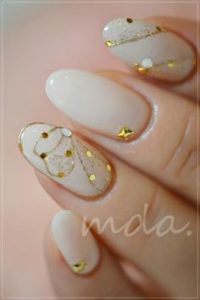 gold and white nails