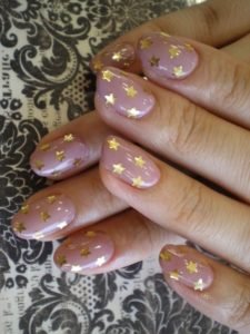 gold stars nail design