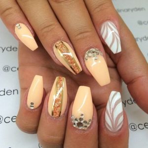 peach and gold nails