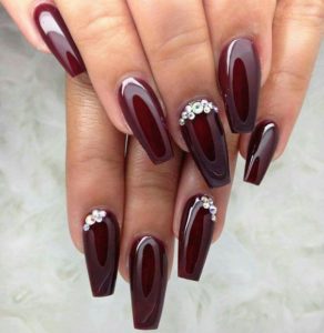 High Shine Burgundy Nails with Silver Embellishment