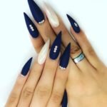 deep blue Stiletto Nail and diamonds