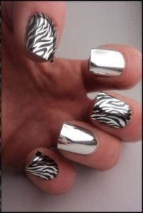 Zebra patterned and silver nails