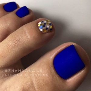 blue matte toe nails with shimmer