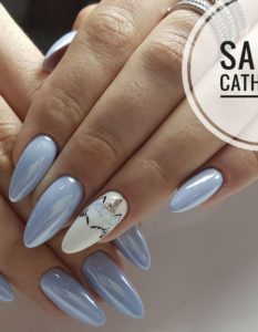Blue nails with unicorn print