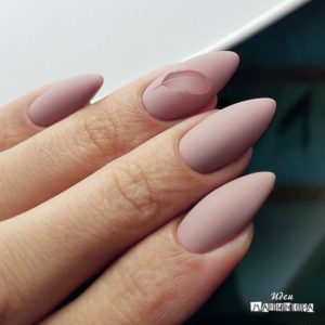 almond-shaped nails in nude