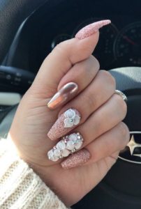 rose gold nails with shimmer and flower decor