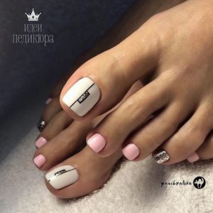 white and pink toenail design with shimmer