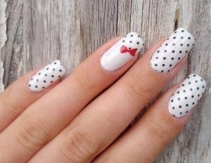 white with black dots and bow