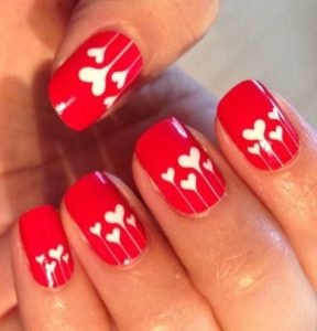 red nail white heart