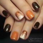 black-orange-nails