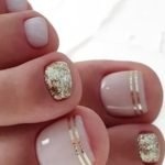 nude gold toe nail design