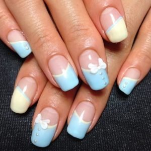 bows and buttons nail design