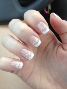 Lace patterns at bottom of white tips