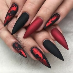 Red nail foil on matte black base