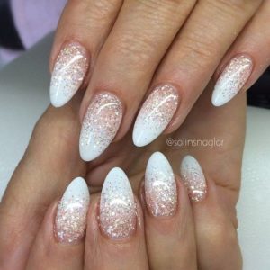Clear sparkle polish over french manicure