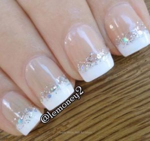 Silver glitter and the bottom of white nail tips