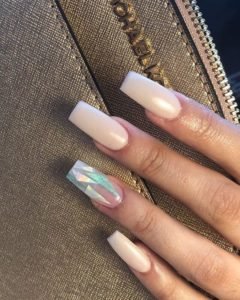 Reflective foil on accent nail