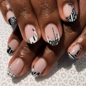 edgy designs on the white nail tips