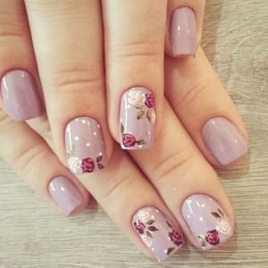 Roses nail art on different nails