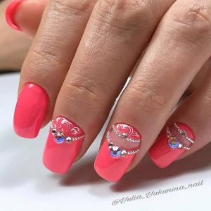 rhinestones on nails to create tiara looking design