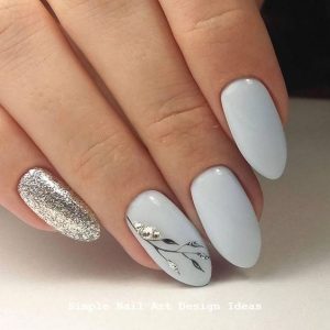 silver nail foil to create leaves on accent nail