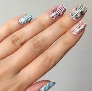 Leaf pattern on every nail in different colours