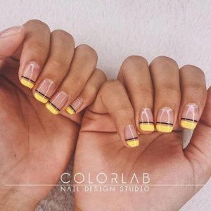 yellow French manicure with black edges