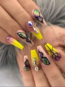 half butterfly nail art on accent nails