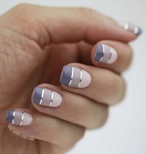 stripes of different muted colours with silver foil accents