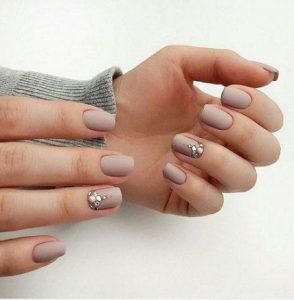 rhinestones on accent nails with matte nails