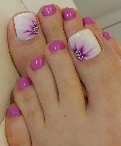 delicate purple floral pedicure