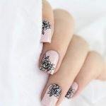black floral stamp on nude