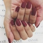 embellished maroon nail